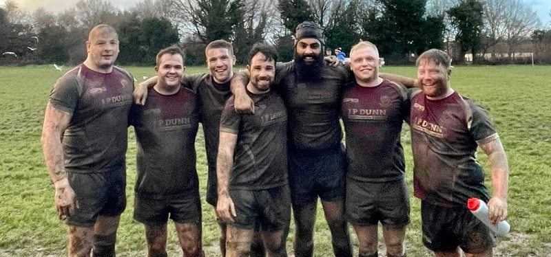 As happy as pigs in...